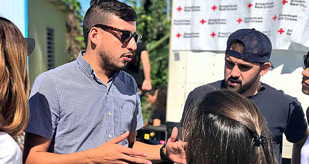 En camisa a cuadros, Jorge E. Pagán, fundador y Director Ejecutivo de la organización "Puerto Rico Cambia". (Foto/Suministrada)